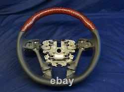 HOLDEN VE COMMODORE SS CARBON FIBRE STEERING WHEELS assorted BLACK RED WOOD